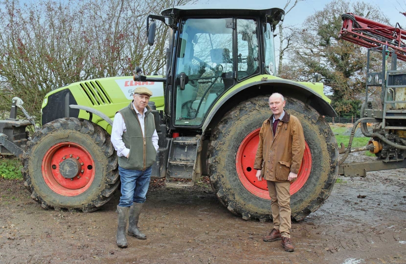 Darryl Preston, right, with Comberton farmer Tim Scott, who, like too many farmers, has had tractors and equipment stolen.